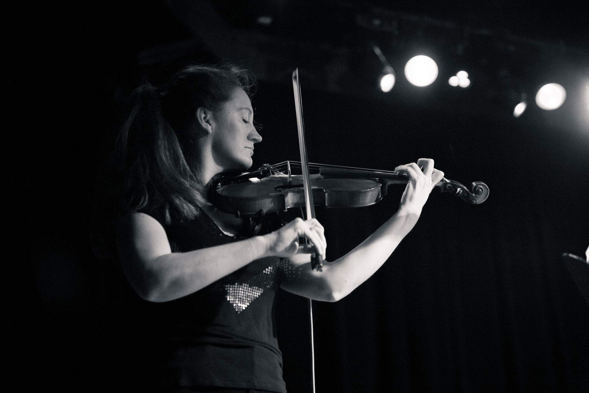 Violinist Brooke Quiggins performing. Photo by Luke Awtry.